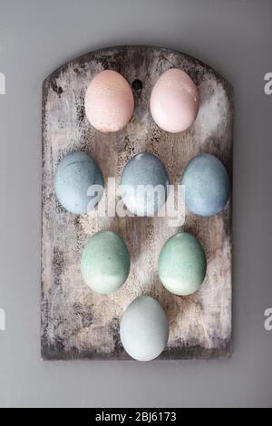 Setting easter table with colored eggs Stock Photo