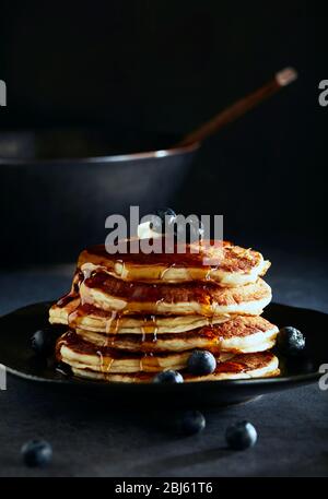 Stack of Blueberry Pancakes with Syrup Stock Photo