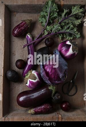 Purple Garden Vegetables in Wooden Bowl Stock Photo