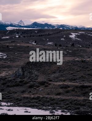 Winter unset over fields in the mountains Stock Photo