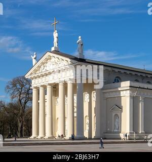 The facade of the main church in Lithuania - the Cathedral Basilica of Saint Stanislaus and Saint Ladislaus of Vilnius. The Cathedral Square Stock Photo