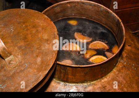 Mulled wine in large pot for sale during Christmas market Stock Photo