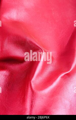 Red shiny leather texture close up Stock Photo
