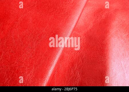 Red shiny leather texture close up Stock Photo