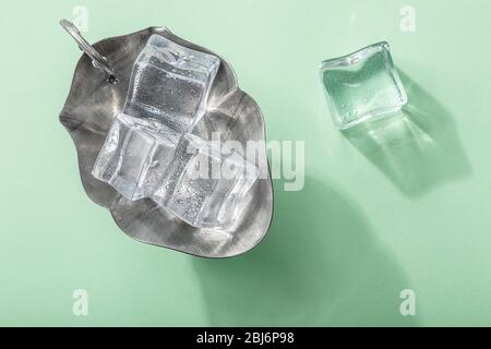 Colored banner with fresh ice cubes and reflections Stock Photo