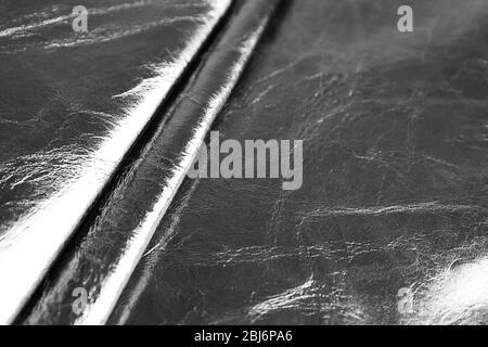 Black shiny leather texture close up Stock Photo