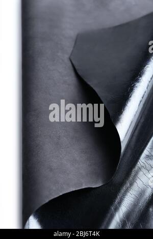Black leather front and wrong side texture, close-up Stock Photo