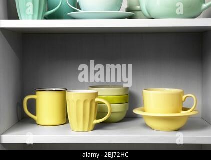 https://l450v.alamy.com/450v/2bj72hc/dishes-in-cupboard-in-the-kitchen-2bj72hc.jpg