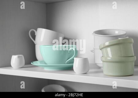 https://l450v.alamy.com/450v/2bj72he/dishes-in-cupboard-in-the-kitchen-2bj72he.jpg