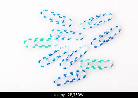 Collection of colourful paper clips, isolated on white Stock Photo