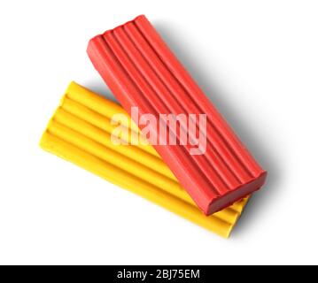 Two bricks of children plasticine, isolated on white Stock Photo