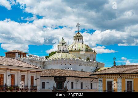The domes of the Jesuit Compania de Jesus church and colonial style facades in the historic city center of Quito, Ecuador. Stock Photo