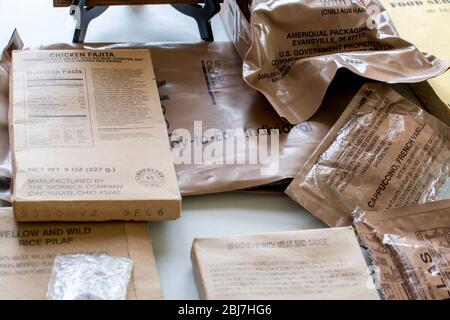 Military ready to eat meals are prepackaged self-contained individual field rations used in combats areas or other conditions where food facilities ar Stock Photo