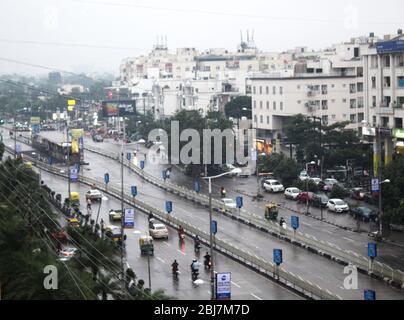 Top view of a developed city road traffic with vehicle, Indian town with business and financial centers and road with cars parking -Indore, India Stock Photo