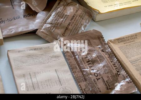 Military ready to eat meals are prepackaged self-contained individual field rations used in combats areas or other conditions where food facilities ar Stock Photo