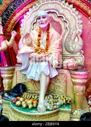 Indian Hindu God Shirdiwale Sai Baba Blessing Stone idol in Hindu Spiritual temple, Regarded by his Devotees as a Saint. Stock Photo
