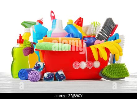 Basin of cleaning supplies on the floor Stock Photo