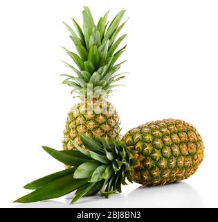 Two ripe fresh pineapples, isolated on white Stock Photo