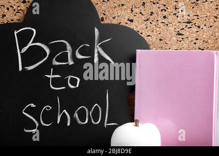 Stationery on cork desk background Stock Photo