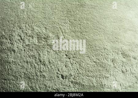 Full frame background of green suede surface. Stock Photo