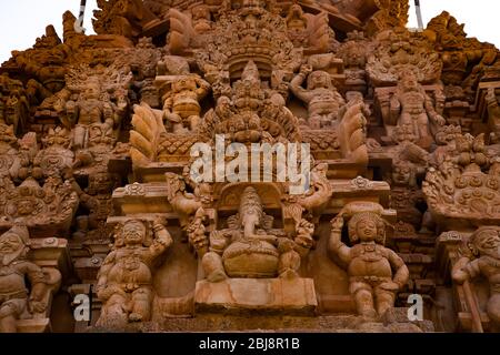 A beautiful closeup view of the statues in temple tower of big temple in Tamil Nadu Stock Photo
