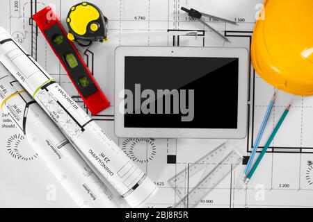 Construction blueprints with tools and tablet, top view Stock Photo