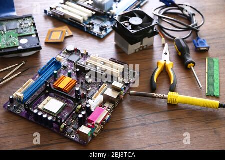 Electronic circuits on wooden background Stock Photo