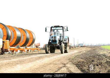 Orange irrigation hose reel, Agricultural Travelling Irrigator or