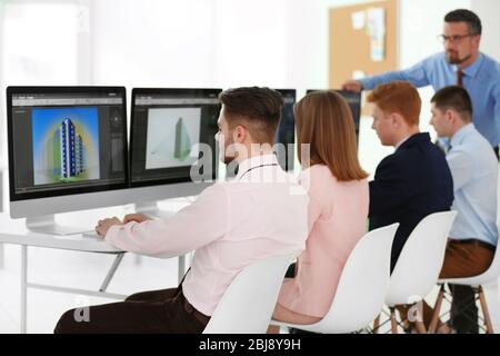 Young engineers working in the office Stock Photo