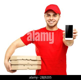 Young man holding pizza and smartphone isolated on white Stock Photo