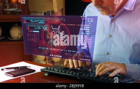 Virus detected alert. Camera moves around hud display and man typing keyboard. Cyber security breach warning with worm symbol on screen. System protec Stock Photo