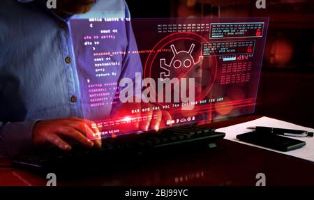 Virus detected alert. Camera moves around hud display and man typing keyboard. Cyber security breach warning with worm symbol on screen. System protec Stock Photo