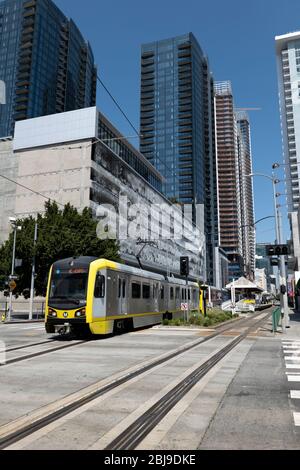 Los Angeles, CA/USA - April 1, 2020: The Metro Gold Line runing through downtown Los Angeles near the Convention Center and Staples Center Stock Photo