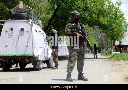 Anantnag, India. 28th Apr, 2020. Security personnel sealed the red zone area of Aswora Kanalwan of South Kashmir's Anantnag district after one coronavirus positive case detected in the area. (Photo by Aasif Shafi /Pacific Press) Credit: Pacific Press Agency/Alamy Live News Stock Photo