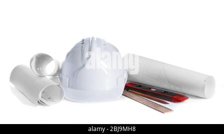 Construction drawings with tools and helmet isolated on white Stock Photo