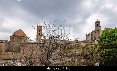 Panoramic view of Volterra - medieval Tuscan town with old houses, towers and churches, Tuscany, Italy. Stock Photo