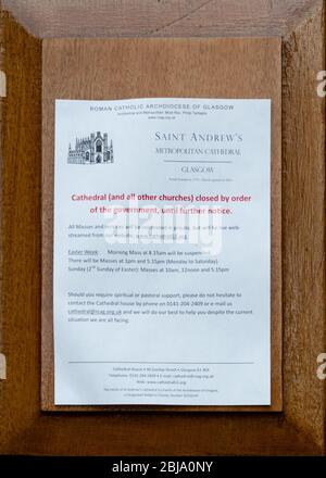 Churches closed by order of the government sign on door of closed Saint Andrews Metropolitan Cathedral during the coronavirus lockdown, Glasgow, UK Stock Photo