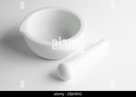 white mortar and pestles on white background Stock Photo