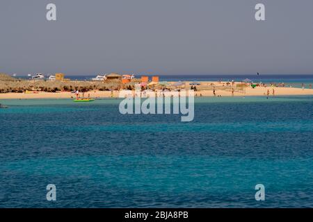 Sandy beach and clear blue waters rich in coral reefs of Giftun island near Hurghada, Red Sea coast, Egypt Stock Photo