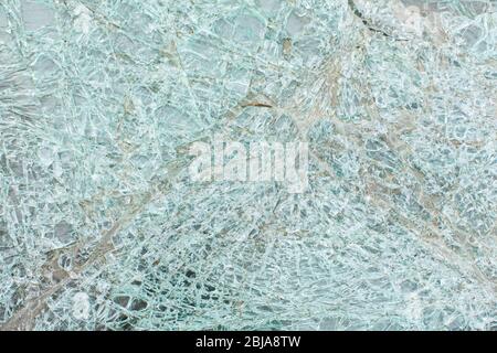 Broken car glass after an accident. Stock Photo