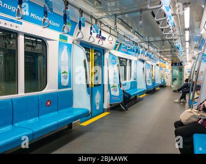 Jakarta, Indonesia - 3rd Apr 2020: Deserted/empty MRT carriage in Jakarta. People are working at home or staying at home due to covid-19 pandemic fear. Stock Photo