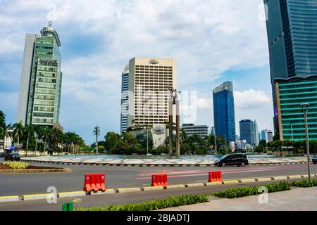 Jakarta, Indonesia - 3rd Apr 2020: Deserted Jakarta streets in Bundaran HI (HI Roundabout) due to fear of covid-19 pandemic. Stock Photo