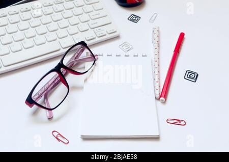 glasses, notepad, keyboard and mouse, Tablet, headphones, notebook, school supplies on white background. Online education concept. Distance school in Stock Photo