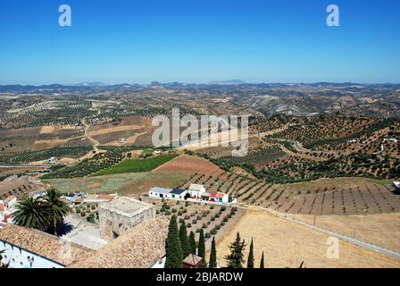 Elevated view of houses on the edge of town and surrounding countryside, Olvera, Cadiz Province, Andalusia, Spain, Western Europe. Stock Photo
