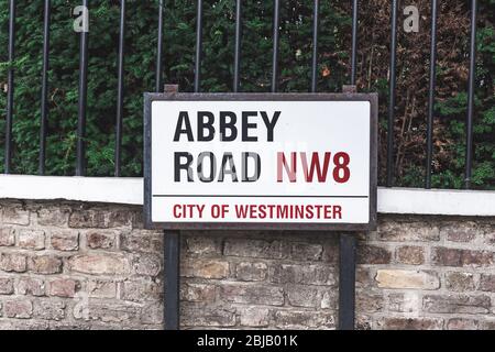 London/UK-30/07/18: Abbey Road name sign, the City of Westminster, London. This road is best known for the Abbey Road Studios and for being the namesa Stock Photo