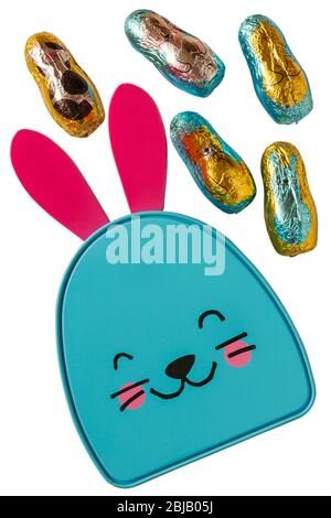 Easter bunny tin with foiled hollow milk chocolate figures isolated on white background - ready for Easter Stock Photo