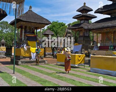 dh Balinese Batuan temple BALI INDONESIA Hindu temples tourists photo traditional dress code hinduism inner sanctum indonesian Stock Photo