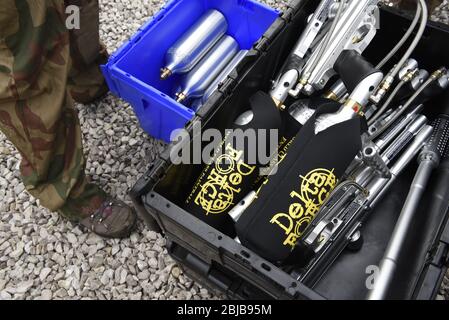 Paintball equipment including guns and air canisters Stock Photo - Alamy