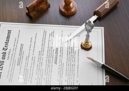 Stamping old notarial wax seal on document Stock Photo