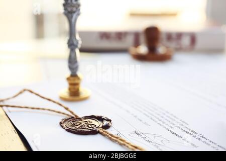 Old notarial wax seal and stamp, closeup Stock Photo